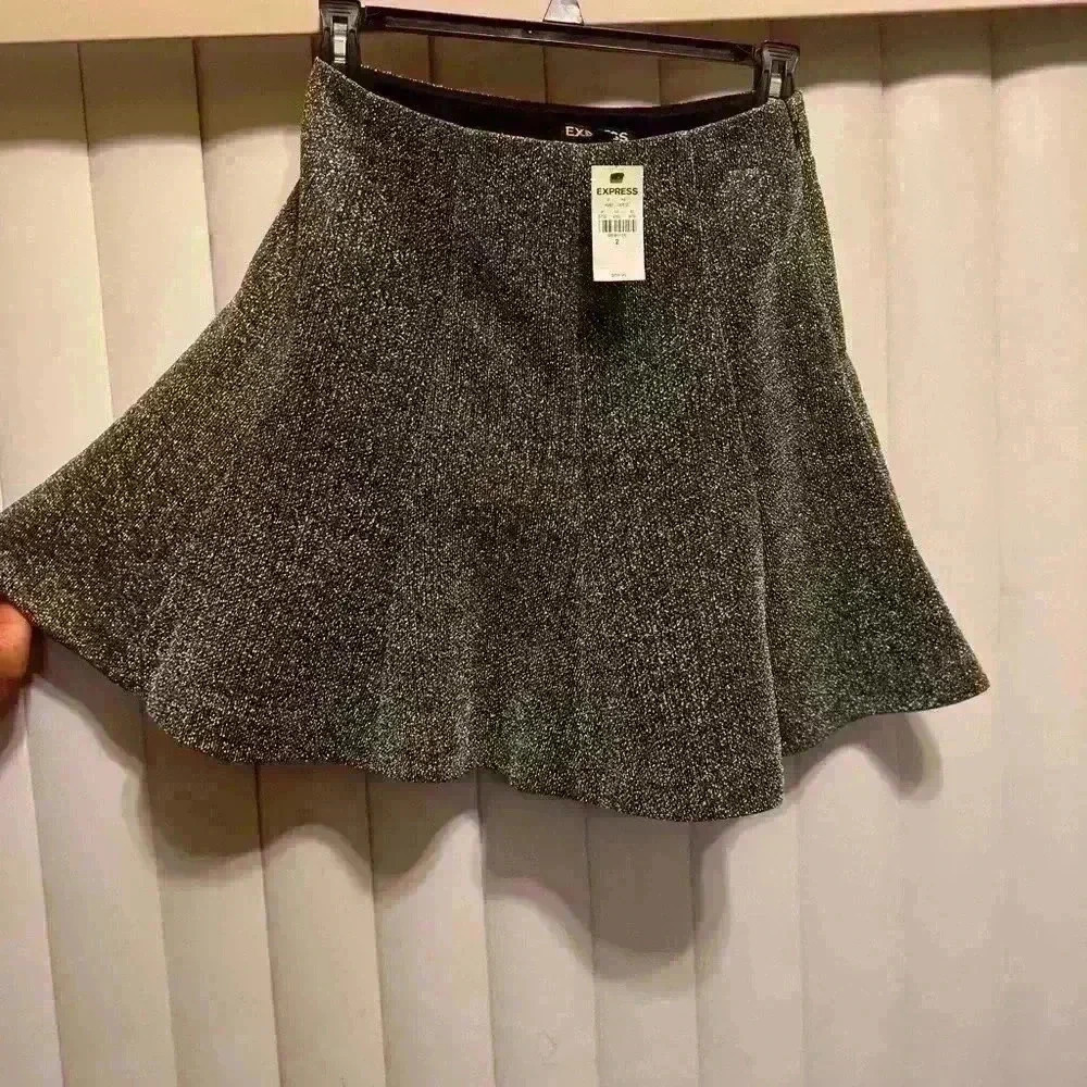 NWT Express Silver Metallic Criss Cross Cut-Out
Crop Тор S and Matching skirt 2 - Picture 7 of 11